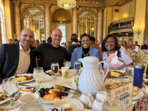 Photo at United Way State of Caring event. From Left to Right Board member Ryan Benz, Founder and Board president Chedy Hampson, Board Secretary Sharon Owens, Board Member Evelyn Ingram